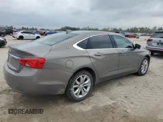 ✅ 2018 Chevrolet Impala LT • VIN: 2G1105S35J9132440 • Лот: 79299114. Опубликован ранее на Copart с пробегом 130 869 миль. Бесплатный доступ к архиву аукционных продаж из США и подробный отчёт об истории автомобиля на DreamBid. Изображение 3.
