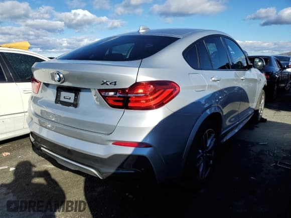 ✅ 2018 BMW X4 xDrive28i • VIN: 5UXXW3C58J0T81232 • Lot: 69434422. Listed on Copart with 50,901 mi. Free auction sales archive from the USA and detailed vehicle history report at DreamBid. Image 3.