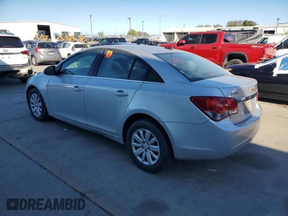 2011 Chevrolet Cruze LS z VIN 1G1PC5SHXB7190124, wystawiony jako Copart lot #86492495 z przebiegiem 226 942 mil mil oraz Szkoda całkowita • Salvage title. Historia ofert i sprzedaży dostępna na DreamBid. Obrazek 2.