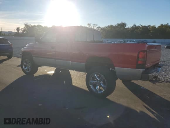 ✅ 2001 Dodge 1500 • VIN: 1B7HC13Y41J542621 • Lot: 92426935. Listed on Copart with 302,102 mi. Free auction sales archive from the USA and detailed vehicle history report at DreamBid. Image 2.