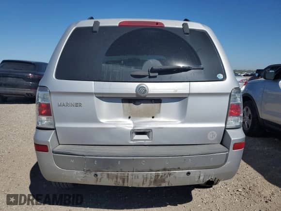 2011 Mercury Mariner z VIN 4M2CN8B77BKJ05126, wystawiony jako Copart lot #48365395 z przebiegiem 179 768 mil mil oraz Szkoda całkowita • Salvage title. Historia ofert i sprzedaży dostępna na DreamBid. Obrazek 6.