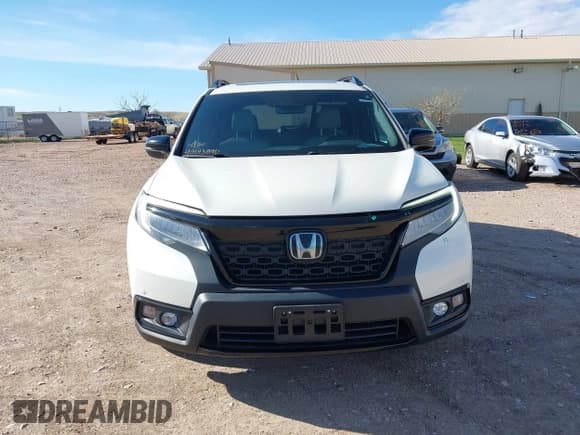 ✅ 2019 Honda Passport Elite • VIN: 5FNYF8H0XKB001472 • Лот: 42143890. Опубликован ранее на IAAI с пробегом 98 119 миль. Бесплатный доступ к архиву аукционных продаж из США и подробный отчёт об истории автомобиля на DreamBid. Изображение 13.