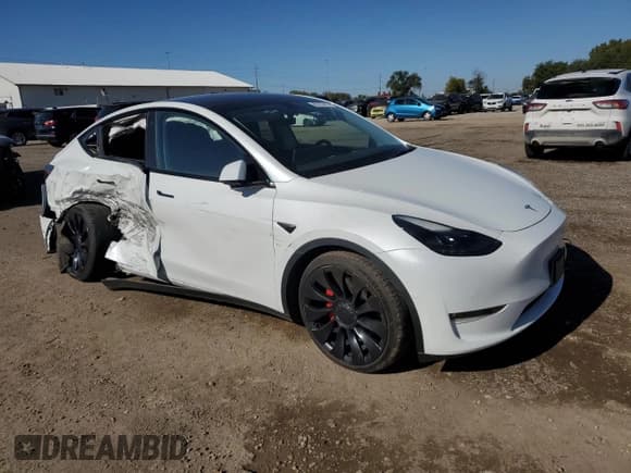 ✅ 2022 Tesla Model Y Performance • VIN: 7SAYGDEF3NF522104 • Lot: 85723415. Listed on Copart with 23,136 mi. Free auction sales archive from the USA and detailed vehicle history report at DreamBid. Image 4.
