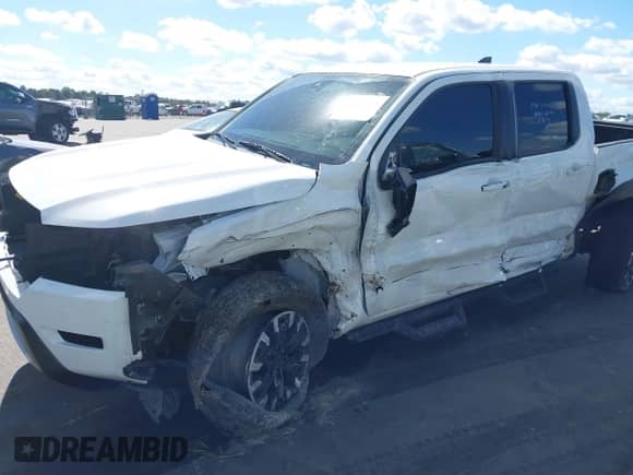 ✅ 2023 Nissan Frontier SV • VIN: 1N6ED1EKXPN630337 • Lot: 43387005. Listed on IAAI with 41,703 mi. Free auction sales archive from the USA and detailed vehicle history report at DreamBid. Image 6.