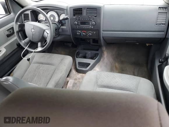 2007 Dodge Dakota ST с VIN 1D7HE28K37S200672, выставлен на аукционе Copart как лот 52682114 с пробегом 135 041 миль миль и Списание • Salvage title. История ставок и продаж доступна на DreamBid. Изображение 8.