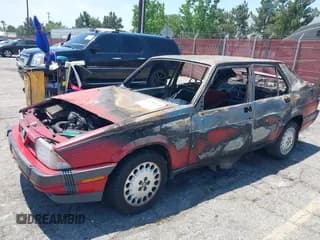 ✅ 1987 Alfa Romeo Milano • VIN: ZARDA116XH1052965 • Лот: 42333036. Опубликован ранее на IAAI с пробегом Не указан. Бесплатный доступ к архиву аукционных продаж из США и подробный отчёт об истории автомобиля на DreamBid. Изображение 6.