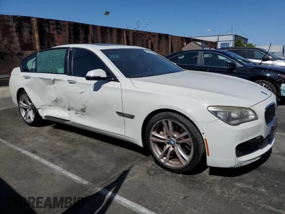 ✅ 2015 BMW 7 Series 750i • VIN: WBAYA8C53FG197751 • Lot: 56249135. Listed on Copart with 98,514 mi. Free auction sales archive from the USA and detailed vehicle history report at DreamBid. Image 4.