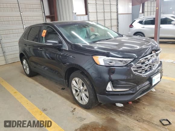 ✅ 2022 Ford Edge Titanium • VIN: 2FMPK4K93NBA54812 • Lot: 90880715. Wystawiony na Copart z przebiegiem 97 062 mil. Bezpłatny archiwum sprzedaży aukcyjnych z USA i szczegółowy raport historii pojazdu na DreamBid. Zdjęcie 4.