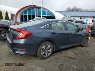 ✅ 2021 Honda Civic LX • VIN: 2HGFC2F65MH557708 • Lot: 92298735. Listed on Copart with 104,002 mi. Free auction sales archive from the USA and detailed vehicle history report at DreamBid. Image 3.
