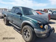 ✅ 2003 Toyota Tacoma PreRunner • VIN: 5TESM92NX3Z298975 • Lot: 41662994. Listed on IAAI with 165,457 mi. Free auction sales archive from the USA and detailed vehicle history report at DreamBid. Image 1.