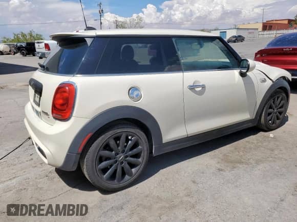2015 MINI Hardtop S with VIN WMWXP7C56F2A58203, listed as a Copart auction lot 62602855 with 101,679 mi miles and Salvage title. Bid and sale history available at DreamBid. Image 3.