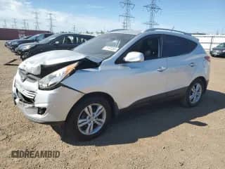 2011 Hyundai Tucson GLS z VIN KM8JU3AC5BU168985, wystawiony jako Copart lot #70140285 z przebiegiem 86 951 mil mil oraz Szkoda całkowita • Salvage title. Historia ofert i sprzedaży dostępna na DreamBid. Obrazek 1.