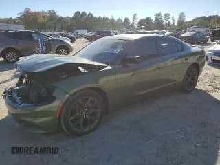 ✅ 2022 Dodge Charger SXT • VIN: 2C3CDXBG8NH186088 • Lot: 86865815. Wystawiony na Copart z przebiegiem 64 437 mil. Bezpłatny archiwum sprzedaży aukcyjnych z USA i szczegółowy raport historii pojazdu na DreamBid. Zdjęcie 1.