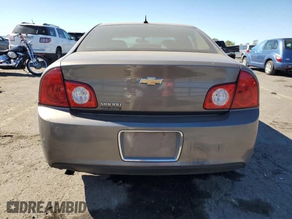 ✅ 2010 Chevrolet Malibu 1LS • VIN: 1G1ZB5EB4A4134988 • Lot: 75615554. Listed on Copart with 74,294 mi. Free auction sales archive from the USA and detailed vehicle history report at DreamBid. Image 6.