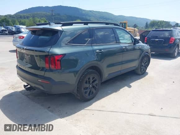 2022 Kia Sorento X-Line S z VIN 5XYRLDLC7NG148434, wystawiony jako IAAI lot #42958663 z przebiegiem 34 462 mil mil oraz . Historia ofert i sprzedaży dostępna na DreamBid. Obrazek 4.