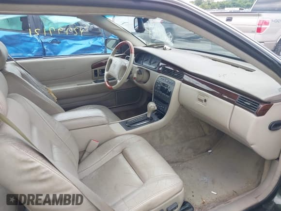 ✅ 2001 Cadillac Eldorado ESC • VIN: 1G6EL12Y01B107760 • Lot: 42797121. Wystawiony na IAAI z przebiegiem 86 446 mil. Bezpłatny archiwum sprzedaży aukcyjnych z USA i szczegółowy raport historii pojazdu na DreamBid. Zdjęcie 5.