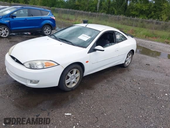 ✅ 2002 Mercury Cougar • VIN: 1ZWFT61L125605219 • Lot: 42859530. Listed on IAAI with 146,062 mi. Free auction sales archive from the USA and detailed vehicle history report at DreamBid. Image 2.