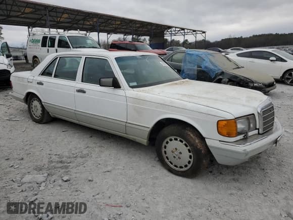 ✅ 1989 Mercedes-Benz 560 • VIN: WDBCA39E0KA469417 • Лот: 43929215. Опубликован ранее на Copart с пробегом 52 559 миль. Бесплатный доступ к архиву аукционных продаж из США и подробный отчёт об истории автомобиля на DreamBid. Изображение 4.