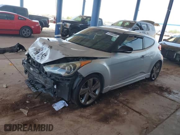 2013 Hyundai Veloster Turbo с VIN KMHTC6AE7DU145337, выставлен на аукционе Copart как лот 61585335 с пробегом 97 892 миль миль и Списание • Salvage title. История ставок и продаж доступна на DreamBid. Изображение 1.
