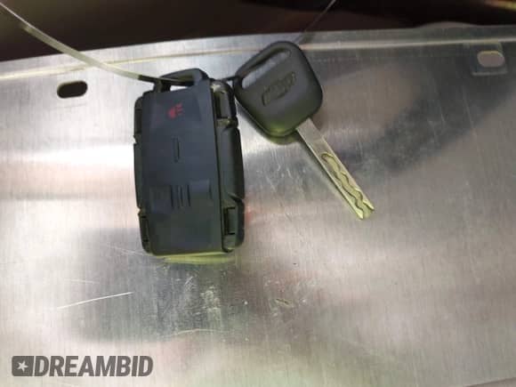 2015 Chevrolet Tahoe LT with VIN 1GNSCBKC2FR500868, listed as a IAAI auction lot 43368598 with 212,885 mi miles and . Bid and sale history available at DreamBid. Image 11.