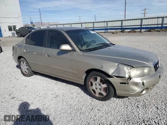 2002 Hyundai Elantra GLS z VIN KMHDN45D22U371819, wystawiony jako Copart lot #77000954 z przebiegiem 177 202 mil mil oraz Szkoda całkowita • Salvage title. Historia ofert i sprzedaży dostępna na DreamBid. Obrazek 4.