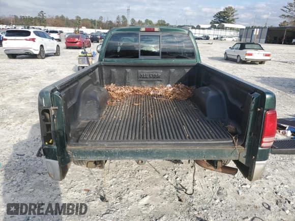 ✅ 2000 Dodge Dakota • VIN: 1B7GL22X6YS527813 • Lot: 85195894. Wystawiony na Copart z przebiegiem 274 996 mil. Bezpłatny archiwum sprzedaży aukcyjnych z USA i szczegółowy raport historii pojazdu na DreamBid. Zdjęcie 6.