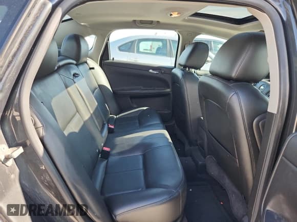 ✅ 2014 Chevrolet Impala LTZ • VIN: 2G1WC5E3XE1108387 • Lot: 82546555. Listed on Copart with 213,398 mi. Free auction sales archive from the USA and detailed vehicle history report at DreamBid. Image 10.