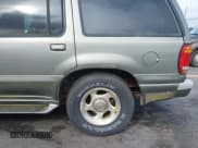 ✅ 2000 Mercury Mountaineer • VIN: 4M2ZU86P8YUJ07066 • Lot: 42114617. Listed on IAAI with 233,146 mi. Free auction sales archive from the USA and detailed vehicle history report at DreamBid. Image 12.