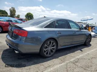 ✅ 2014 Audi A6 Prestige • VIN: WAUHGAFC1EN061502 • Лот: 66026615. Опубликован ранее на Copart с пробегом 129 023 миль. Бесплатный доступ к архиву аукционных продаж из США и подробный отчёт об истории автомобиля на DreamBid. Изображение 3.