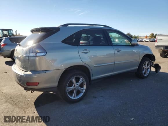 ✅ 2007 Lexus RX 400h • VIN: JTJGW31U272002215 • Лот: 90912615. Опубликован ранее на Copart с пробегом 211 493 миль. Бесплатный доступ к архиву аукционных продаж из США и подробный отчёт об истории автомобиля на DreamBid. Изображение 3.