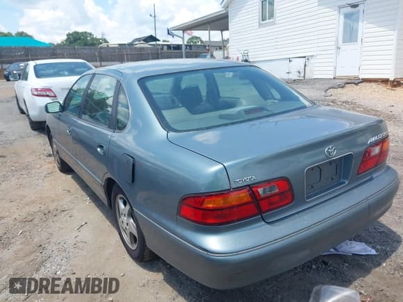 ✅ 1999 Toyota Avalon XL • VIN: 4T1BF18B4XU321279 • Lot: 42726733. Listed on IAAI with 232,187 mi. Free auction sales archive from the USA and detailed vehicle history report at DreamBid. Image 3.