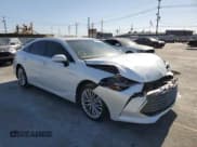 ✅ 2020 Toyota Avalon Limited Hybrid • VIN: 4T1D21FB9LU013719 • Лот: 65184172. Опубликован ранее на Copart с пробегом 18 714 миль. Бесплатный доступ к архиву аукционных продаж из США и подробный отчёт об истории автомобиля на DreamBid. Изображение 1.