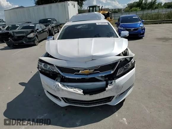 2017 Chevrolet Impala Premier z VIN 2G1145S32H9145788, wystawiony jako Copart lot #87188465 z przebiegiem 77 672 mil mil oraz Szkoda całkowita • Salvage title. Historia ofert i sprzedaży dostępna na DreamBid. Obrazek 14.