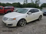 ✅ 2012 Lincoln MKS • VIN: 1LNHL9DR8CG805789 • Lot: 67300135. Listed on Copart with 115,292 mi. Free auction sales archive from the USA and detailed vehicle history report at DreamBid. Image 1.