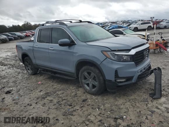 ✅ 2022 Honda Ridgeline RTL-E • VIN: 5FPYK3F75NB038052 • Lot: 90275235. Listed on Copart with 73,543 mi. Free auction sales archive from the USA and detailed vehicle history report at DreamBid. Image 4.
