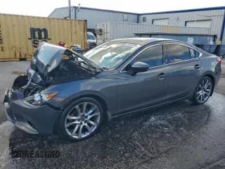 ✅ 2015 Mazda 6 i Grand Touring • VIN: JM1GJ1W59F1210846 • Lot: 94333845. Listed on Copart with 156,080 mi. Free auction sales archive from the USA and detailed vehicle history report at DreamBid. Image 1.