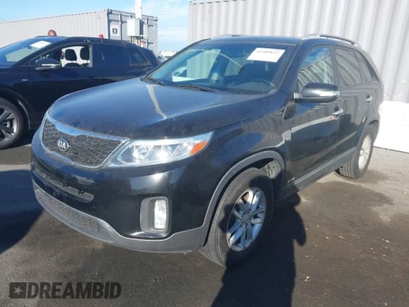 ✅ 2014 Kia Sorento LX • VIN: 5XYKTCA64EG475995 • Lot: 43409637. Listed on IAAI with 145,011 mi. Free auction sales archive from the USA and detailed vehicle history report at DreamBid. Image 2.