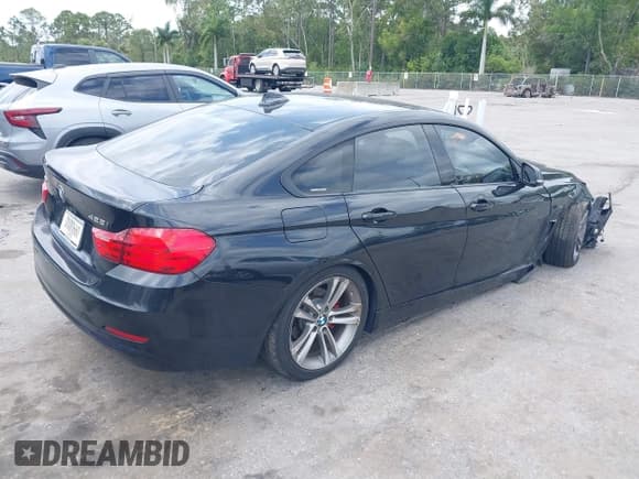 ✅ 2015 BMW 4 Series 428i xDrive • VIN: WBA4A7C55FD414405 • Lot: 39159752. Listed on IAAI with 121,009 mi. Free auction sales archive from the USA and detailed vehicle history report at DreamBid. Image 4.