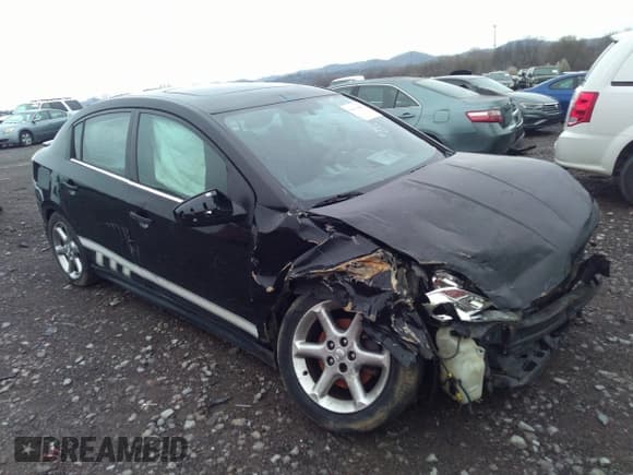 ✅ 2008 Nissan Sentra SE-R • VIN: 3N1BB61E08L665725 • Lot: 36018059. Listed on IAAI with Not provided. Free auction sales archive from the USA and detailed vehicle history report at DreamBid. Image 1.
