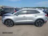 ✅ 2018 Lincoln MKC Reserve • VIN: 5LMTJ3DHXJUL21185 • Lot: 42675350. Listed on IAAI with 112,879 mi. Free auction sales archive from the USA and detailed vehicle history report at DreamBid. Image 14.