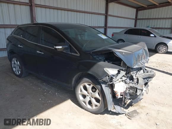 ✅ 2010 Mazda CX-7 Touring • VIN: JM3ER2W32A0339750 • Lot: 42248777. Listed on IAAI with 124,181 mi. Free auction sales archive from the USA and detailed vehicle history report at DreamBid. Image 1.