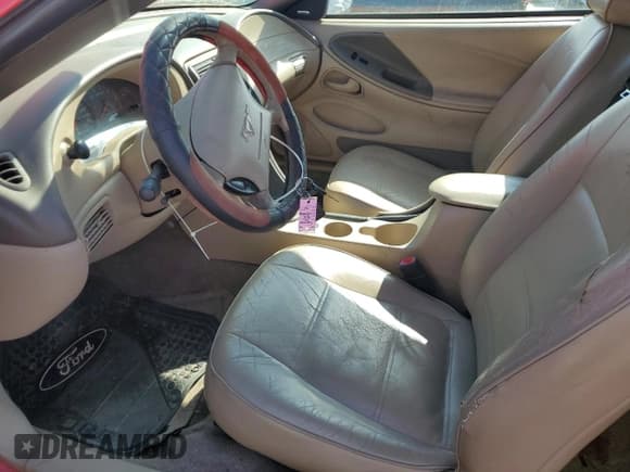 ✅ 2003 Ford Mustang Deluxe • VIN: 1FAFP44413F386140 • Lot: 85580595. Listed on Copart with 96,580 mi. Free auction sales archive from the USA and detailed vehicle history report at DreamBid. Image 7.