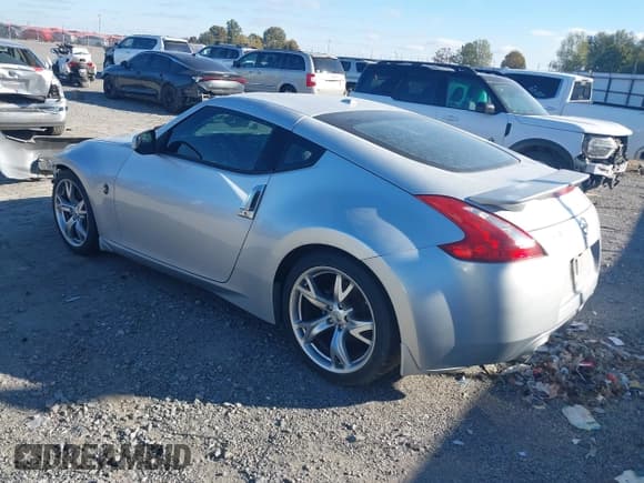 ✅ 2009 Nissan 370Z Touring • VIN: JN1AZ44EX9M403421 • Lot: 43590769. Listed on IAAI with 182,981 mi. Free auction sales archive from the USA and detailed vehicle history report at DreamBid. Image 3.