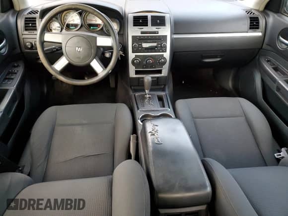 2010 Dodge Charger SXT с VIN 2B3CA3CV8AH246845, выставлен на аукционе Copart как лот 82592514 с пробегом 148 457 миль миль и Чистый • Clean title. История ставок и продаж доступна на DreamBid. Изображение 8.