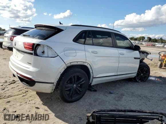 ✅ 2023 Volkswagen Atlas SEL • VIN: 1V2SE2CA4PC210229 • Лот: 46238235. Опубликован ранее на Copart с пробегом 23 263 миль. Бесплатный доступ к архиву аукционных продаж из США и подробный отчёт об истории автомобиля на DreamBid. Изображение 3.