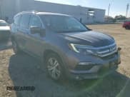 ✅ 2018 Honda Pilot EX-L • VIN: 5FNYF6H56JB028361 • Lot: 93402365. Listed on Copart with 139,342 mi. Free auction sales archive from the USA and detailed vehicle history report at DreamBid. Image 14.