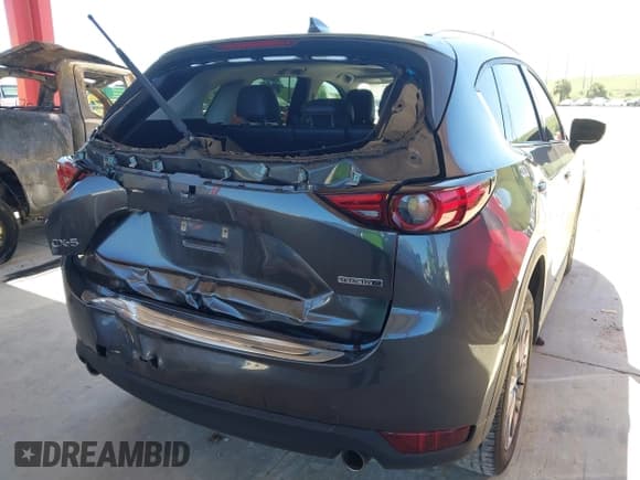 ✅ 2021 Mazda CX-5 Grand Touring • VIN: JM3KFADM9M1381655 • Lot: 43436750. Wystawiony na IAAI z przebiegiem 64 217 mil. Bezpłatny archiwum sprzedaży aukcyjnych z USA i szczegółowy raport historii pojazdu na DreamBid. Zdjęcie 18.