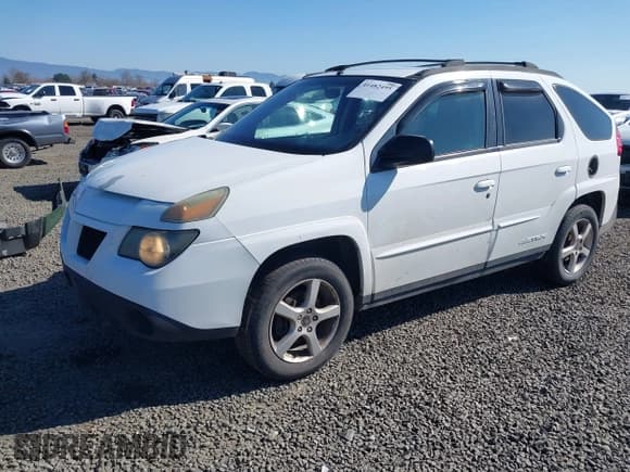 ✅ 2004 Pontiac Aztek • VIN: 3G7DB03E14S557211 • Lot: 41482495. Listed on IAAI with 137,817 mi. Free auction sales archive from the USA and detailed vehicle history report at DreamBid. Image 2.