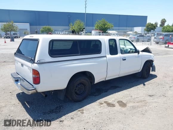 ✅ 1999 Toyota Tacoma • VIN: 4TAVL52NXXZ454051 • Lot: 42630891. Wystawiony na IAAI z przebiegiem 338 836 mil. Bezpłatny archiwum sprzedaży aukcyjnych z USA i szczegółowy raport historii pojazdu na DreamBid. Zdjęcie 4.