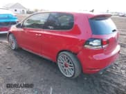 ✅ 2012 Volkswagen Golf GTI w/Conv & Sunroof • VIN: WVWEV7AJ9CW292286 • Lot: 41478359. Listed on IAAI with 153,000 mi. Free auction sales archive from the USA and detailed vehicle history report at DreamBid. Image 3.